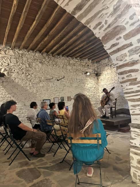 Classical guitar concert in a historic olive press - Cheese, wine, and a taste of Naxos