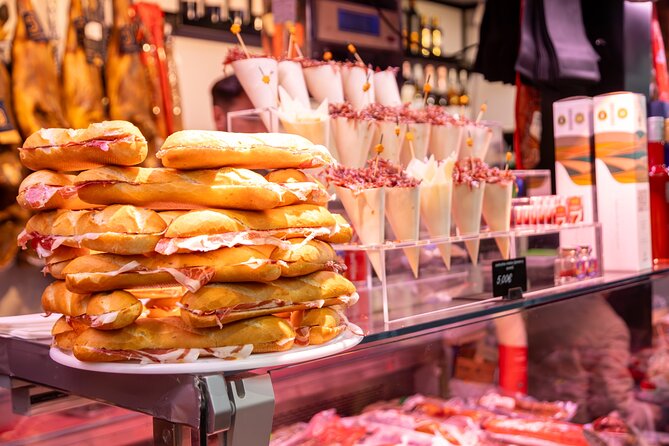 Malaga Food Tour with 12+ Tastings: Tapas, Olive Oil, Ham & More - Key points at a glance
