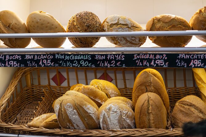 Malaga Food Tour with 12+ Tastings: Tapas, Olive Oil, Ham & More - What the $104.53 price includes