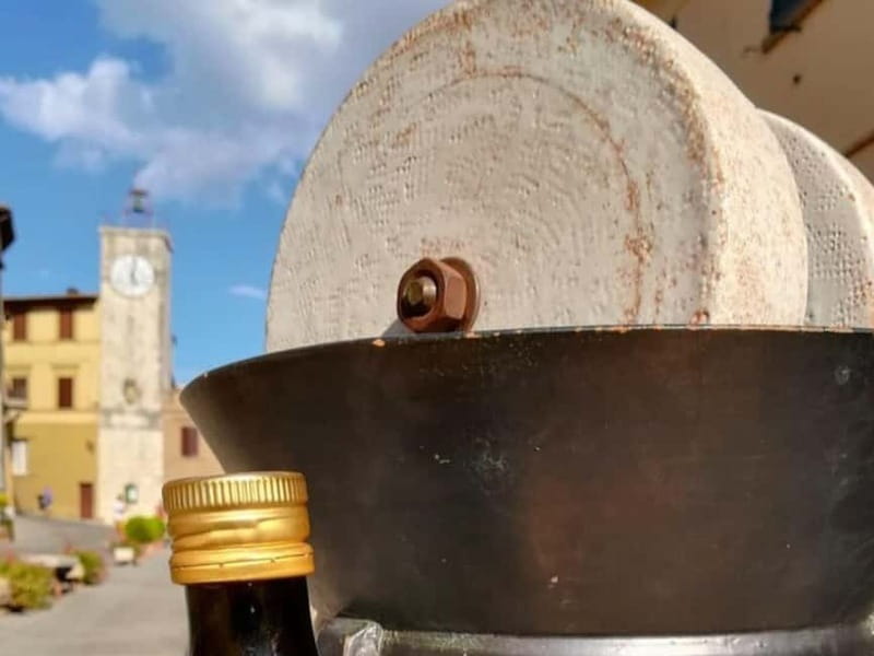 Olive Mill Tour with Oil and Food Tasting in Chianciano - Entering the mill and its 16th-century wooden press