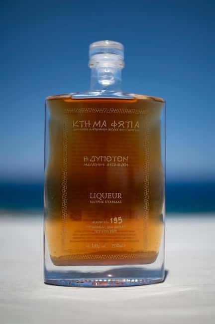 Santorini: Private Olive Oil tasting & Liqueur experience - Must cookies, breadsticks, and no-sugar juice